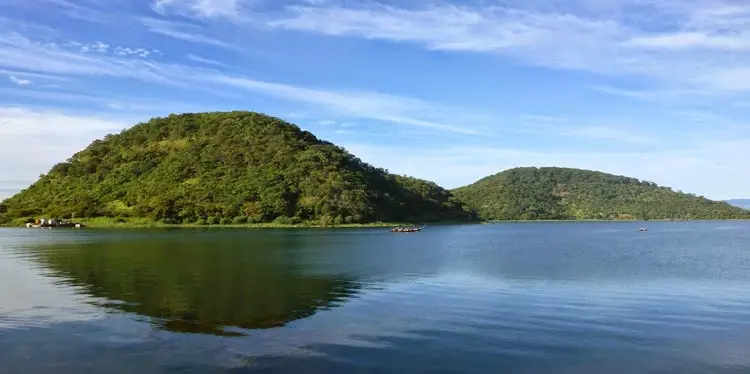 Lake Tanganyika and green hills representing the Rumonge shoreline